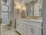 Shared Guest Bathroom with Double Vanity and Shower at 28 Stoney Creek